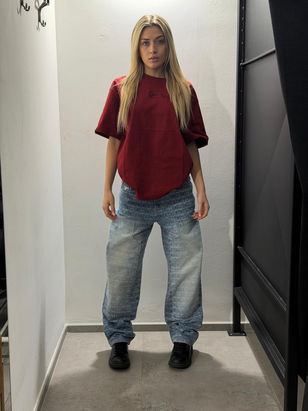 jeans karl kani con lettere in rilievo